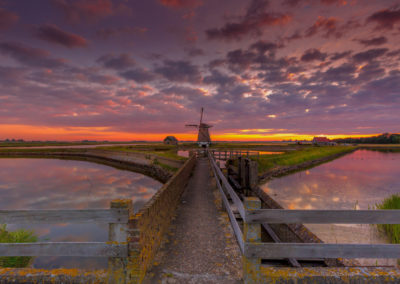 Molen op Texel centraal in het landschap gemaakt door landschapsfotograaf Andy Luberti